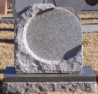 BOULDER WITH POLISHED CIRCULAR PANEL 